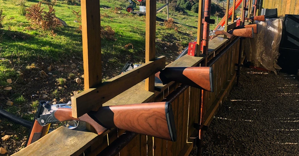 Shotguns lined up at a clay pigeon shooting range near Carlingford