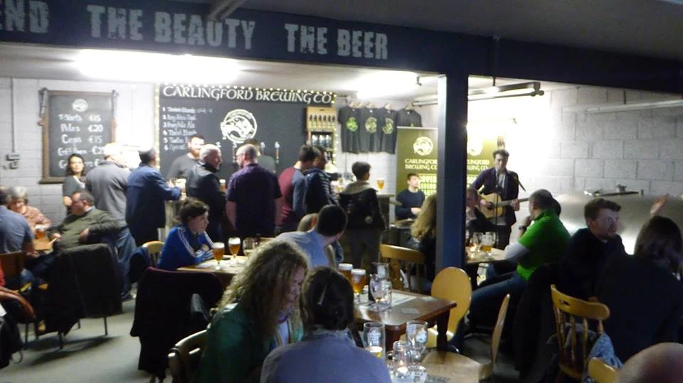 Brewery taproom with craft beer and pizza