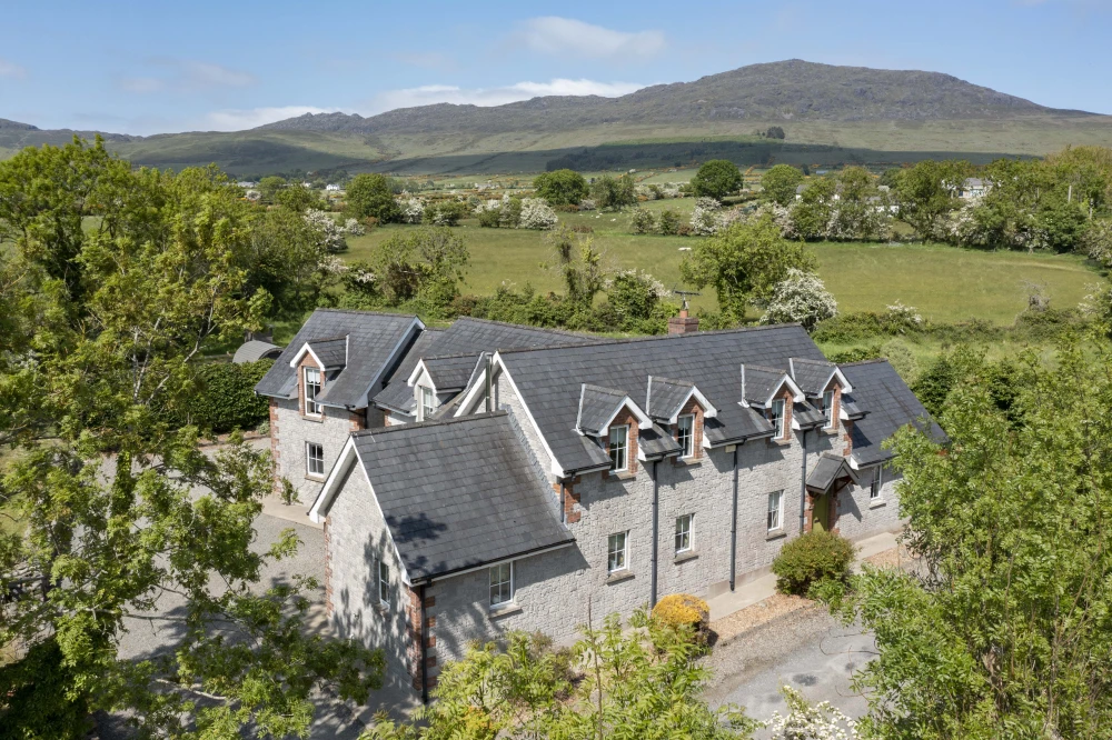 Aerial view of Swallows Retreat country house with Cooley Mountains behind