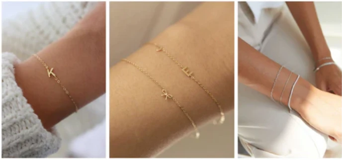Delicate gold permanent jewellery bracelets on wrists
