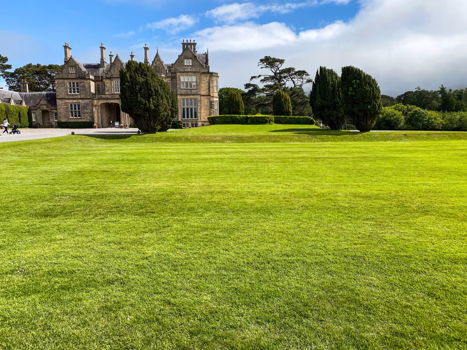 The front approach to Muckross House, a large Tudor Revival mansion in Killarney National Park, County Kerry