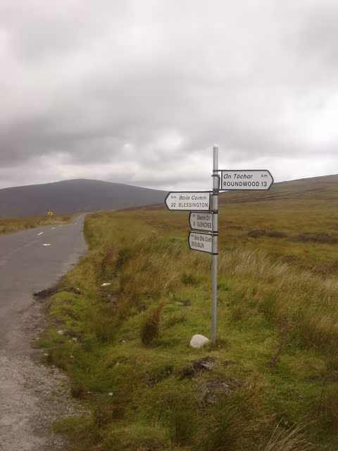 A lone signpost at the Sally Gap crossroads on the bog in the Wicklow Mountains