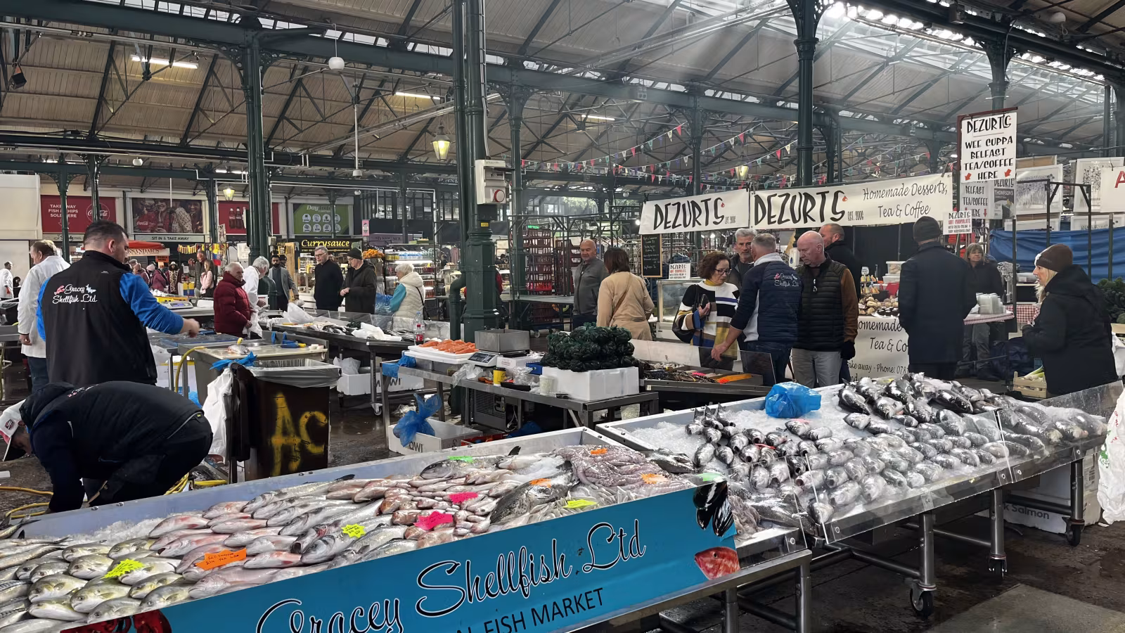 A fresh fish and seafood stall inside St George's Market Belfast with produce on display